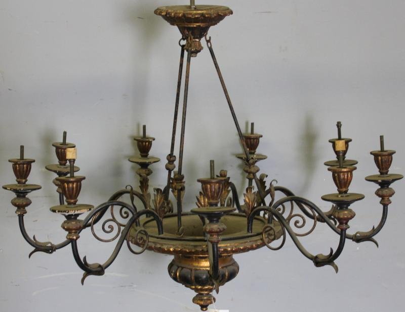 Vintage Italian Style Gilt, Ebonized and Wrought: Iron 9 Light Chandelier. From a Manhattan lighting business now closed. Dimensions: 33" diameter x 24" high, Condition: As found - not electrified.