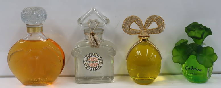 4 Vintage & Large Advertising Perfume Bottles.: To include: Guerlain, Cabotine, White Diamond and Nina Rici. From an Albertson, Long Island, NY estate. - Dimensions: 12" h & 12.5" h.
