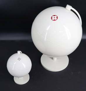 2 Louis Vuitton LV Modern Design World Globe: Displays . 2 Louis Vuitton white globe displays. From New York store promotional display. Spinning globes features white surface with one icon from Louis Vuitton pattern. From an Eastchester store bas