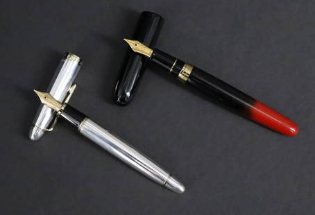 (2) Japanese 1911 Sailor Fountain Pens.: Fountain Pens. To include a Japanese Sailor 1911 Sterling silver 925 Fountain Pen fountain pen. This specific pen, boast a 21kt yellow gold nib, gold-plated accents, and a barrel and cap made from ste