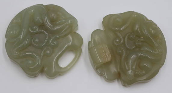 Chinese Carved Jade Belt Buckle.: 2 piece Chinese carved Celadon jade belt buckle displaying a Qilin. Total approx. weight of the belt buckle is 143.0 grams (gross). From a Durham, CT estate. Dimensions: belt buckle measures approx. 2