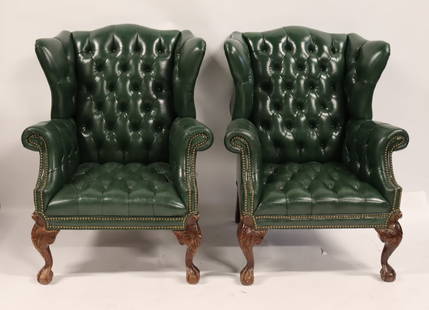 Vintage & Fine Quality Pair Of Green Leather Wing: Back Chesterfield Style Chairs. Good size, comfy and with great patina. From a Greenwich, CT estate. - Dimensions: 43" h x 34" w x 29" d.