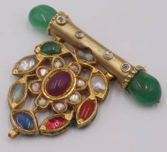 JEWELRY. Mughal Diamond, Gem, and Pearl Brooch.: Mughal navaratna? pendant displaying a central ruby cabochon surround by (8) colored gems, diamonds or pearls with the alternate side displaying a floral motif in enamel of green, white, and red - min