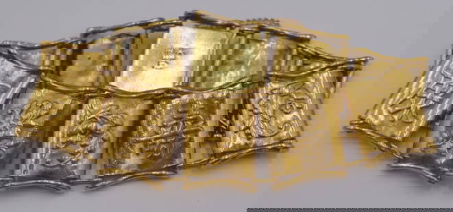 JEWELRY. Chinese High Karat Gold Bracelet.: Chinese high karat gold bracelet comprised of a total of (10) pendant displaying alternating depictions of Chinese characters and flowers. Stamped to the clasp with a 2-character mark signifying a 99.