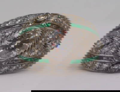 JEWELRY. Platinum Diamond and Emerald Ring.: Antique platinum ring displaying a central bezel set Old European cut diamond measuring approx. 6.8mm, approx. color of H/I and approx. clarity of VS1?VS2 (mounting permitted). Center stone is surroun