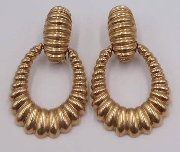 JEWELRY. Pair of 14kt Gold Door Knocker Earrings.: Pair of 14kt yellow gold door knocker form earings of ribbed design. Stamped, "14K". Total approx. weight of the earrings is 13.7 dwt (gross). From the estate of lifelong collector, designer