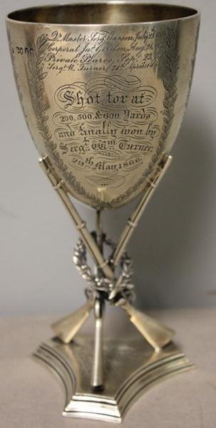 STERLING. English Trophy Cup With Rifles Support.: Engraved, "Challenge cup presented by the officers John Hottingworth ESQ being Capt'n Comm". Many other inscriptions including "Shot for at 200, 500 and 600 yards and finally won by Sargent Wm. Turner