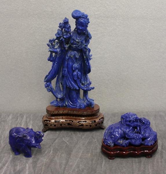 Chinese Lapis Lazuli Figures.: Including a Quan Yin, two seated foo dogs and a small elephant. Excellent quality carvings. From a Scarsdale, NY estate. Dimensions: Quan Yin - 7.625" high, including base. Condition: Good.