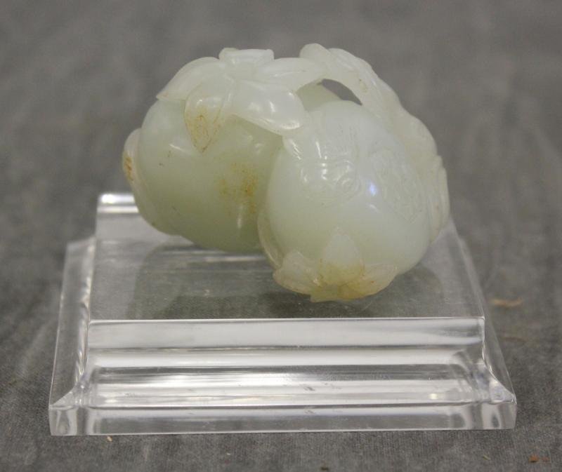 Important Antique Jade Pomegranates.: Qing Dynasty, 1644-1912, Qianlong period. As published in Michael Weisbrod Inc. NY catalog, titled "Buddhist Sculpture Design and Influence," published in 1992. This is item #52 on page 11. Book is in