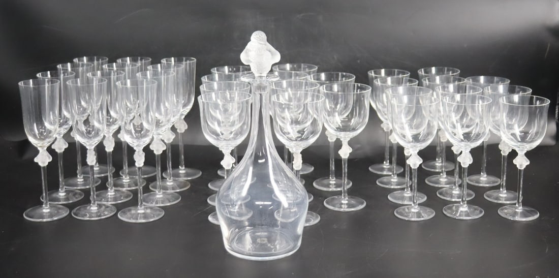 Lalique France Roxane Decanter & Stemware: The pattern is Roxane. To include 34 glasses total; 11 flutes 8.75"; 11 red (?) wine 8"; 11 white (?) wine 7.5", plus the decanter (12.5"). From a Great Neck, Long Island NY estate