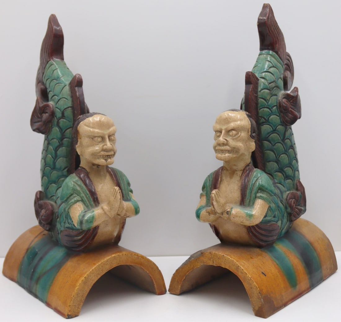 Pair of Chinese Sancai Roof Tile of Merpeople.: (2) Chinese Sancai glazed roof tiles in the form of mermen with palms pressed together in gassho. Fingers are set atop a curved roof tile. From a Cold Spring, NY estate. Dimensions: roof tiles measure