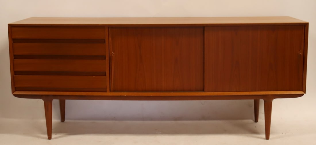 Omann Jun Midcentury Danish Teak Sideboard.: Danish teak sideboard by Omann Jun, model Nr 18 with sliding doors, apparently unsigned. From a Piermont, NY estate. Dimensions: 32.75" h x 78.75" w x 18.75" d.