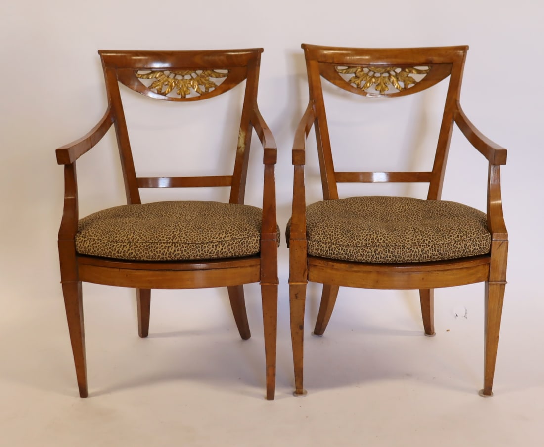 A Fine Pair Of Antique Carved & Gilt Decorated: French Armchairs. Nice original chairs with carved and gilt decorated backs and caned seats. From a Sutton Place, NYC estate. - Dimensions: 36" h x 22.5" w x 23" d.