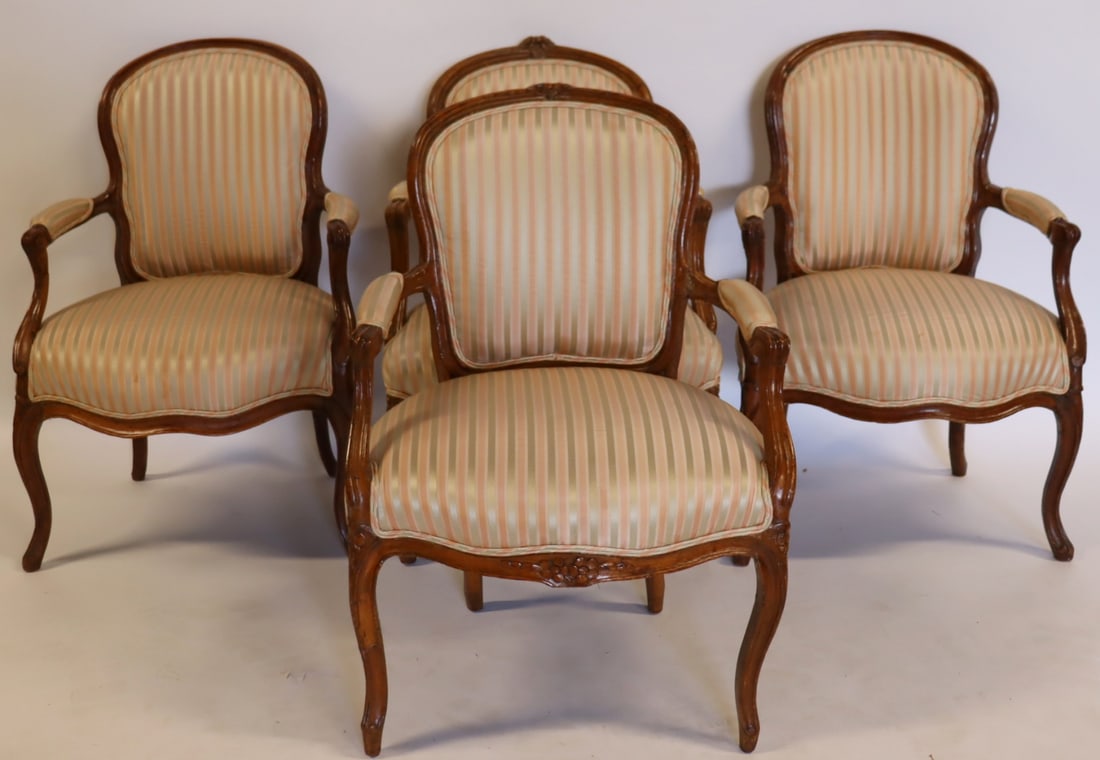 4 Louis XV Upholstered Fauteils: 2 matched pairs. 2 with carving. From a Sutton Place, NYC estate. - Dimensions: 34" h x 22.5" w x 21" d.