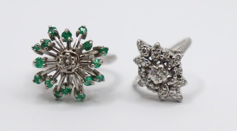 JEWELRY. (2) 14kt Diamond and Gem Rings.: Including an unmarked14kt white gold cocktail ring with central prong-set diamond and a surround of prong-set faceted green gem accents, ring size - 4 1/2; and an unmarked 14kt white gold diamond clus