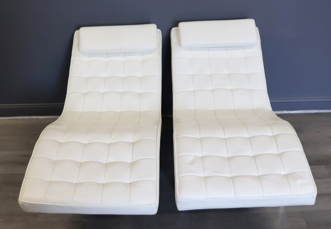 A Modernist Pair Of Leather & Chrome Chaises.: From a Holmes, NY estate. - Dimensions: 31" h x 26" w x 64" d.