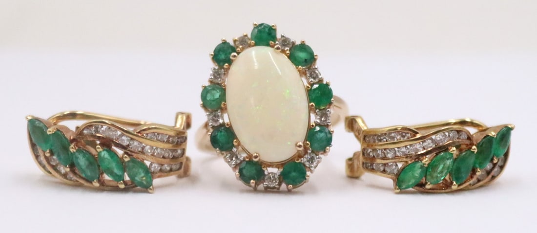 JEWELRY. Pair of 18kt Gold, Emerald and Diamond: Earrings. Pair of 18kt yellow gold earrings displaying (5) marquis cut emeralds accented by pave diamonds - stamped, "750 18K" with a third unidentified mark. Accompanied by a 9kt yellow gol