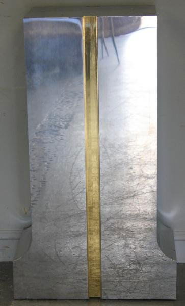 Karl Springer Midcentury Brass & Steel Pedestal.: Nice style and shape. Extremely heavy. From an East 69th St, NYC estate. Dimensions: 24.5" wide x 13.5" deep x 42" high. Condition: Good.