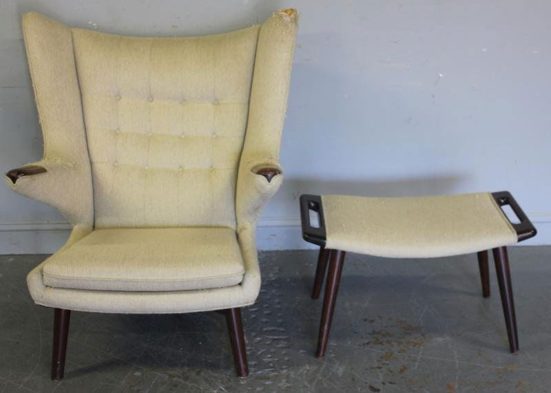 Hans Wegner. "Papa Bear" Chair &: Ottoman. Denmark circa 1950. Unsigned. From a Ridgewood, Queens, NY estate. Dimensions: Chair - 39" wide x 36" deep x 32" high and an ottoman - 37" wide x 15" deep x 16" high. Condition: Upholstery vi