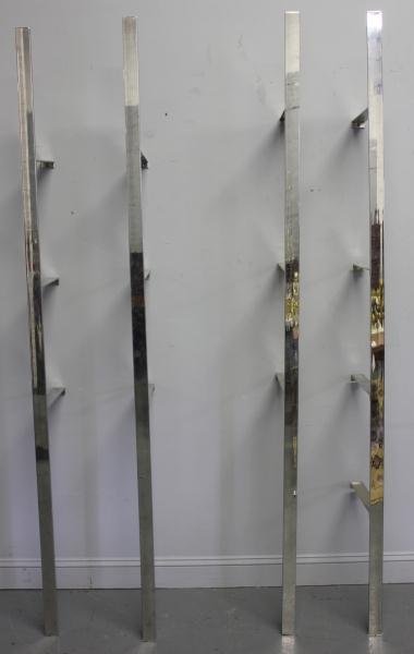 Two Midcentury Chrome Wall Mounted Etageres: Possibly Milo Baughman. From a La Grangeville, NY estate. Dimensions: 13.5" deep x 89" high. Condition: Good.