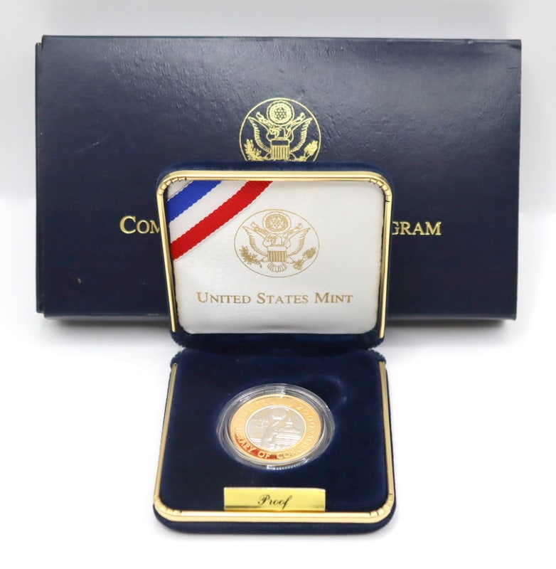 NUMISMATICS. 2000 W $10 Library of Congress: Commemorative PF UC Coin. A 2000 Westpoint (W) $10 Library of Congress Commemorative bimetallic gold and platinum coin in a ultra cameo (UC) proof finish (PF). The total mintage for this date & mi