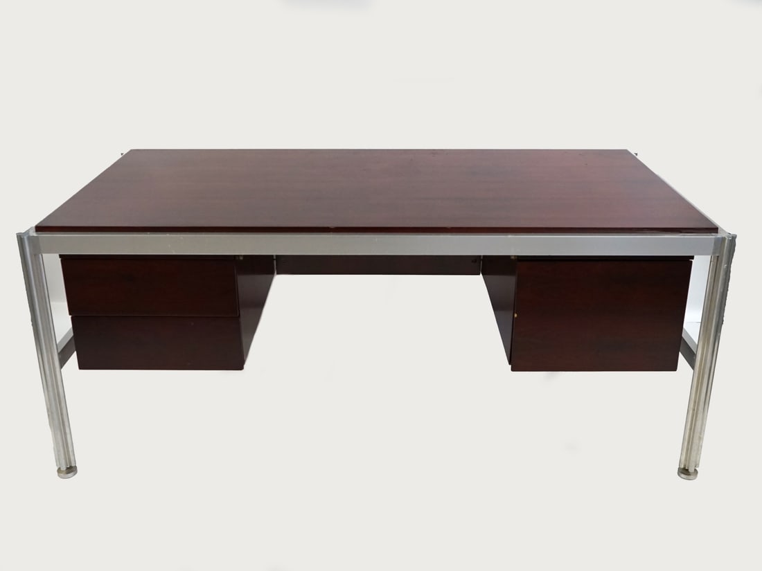 George Ciancimino Executive Rosewood Desk.: Desk has a great grain on its rosewood and the legs fluted stainless . From a Bronxville, NY estate. - Dimensions: 30" h x 72" w x 38" d.