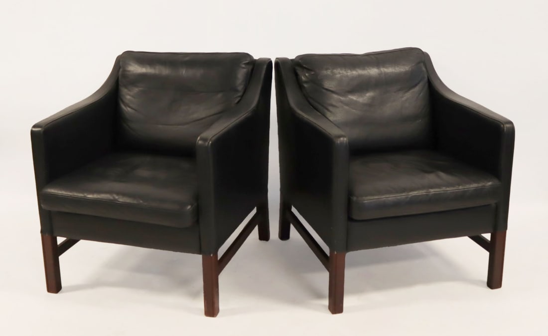 Midcentury Pair Of Danish Modern Svend Skipper: Chairs. Black leather, Takashi Okamura and Erik Marquardsen for Svend Skipper, Denmark. From a Bronx, NY estate. - Dimensions: 32.5" h x 26.25" w x 31" d.