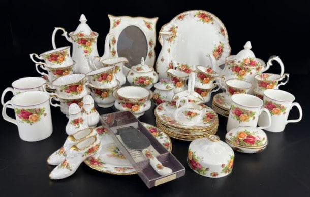 ROYAL ALBERT OLD COUNTRY ROSE BONE CHINA: Grouping of Royal Albert Old Country Rose Porcelain. Mix of older and new country rose. To include 6 coffee cups 3"h and 6 Saucers 5.50"d, 4 Tea Cups 3.75"h, 5 demitasse cups 2.75"