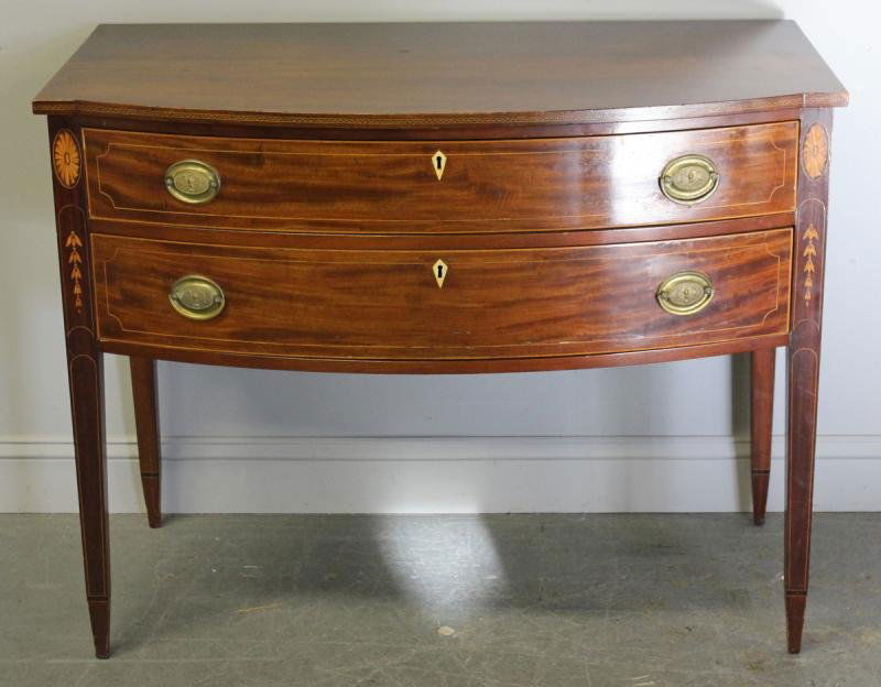 Antique American Hepplewhite Bowfront Server.: Nice diminutive size. Surely an identifiable cabinet shop with a sort of greek key banding, bellflower, patarae and line inlay, ebony cuffs, ivory escutcheons, and eagle embossed hardware. From a New
