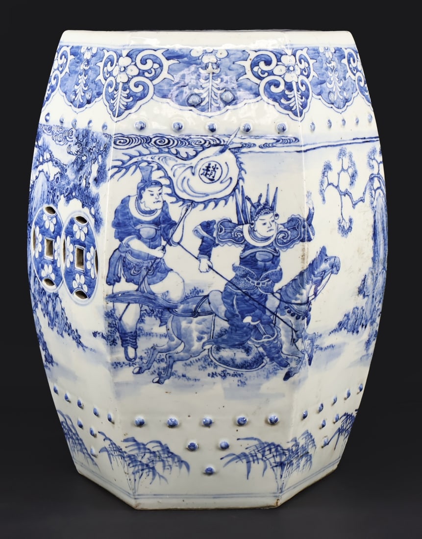 Chinese Blue and White Garden Seat.: A hexagonal Chinese blue and white garden seat with applied drum nail accents displaying a Zhao rider on horseback accompanied by an attendant and a man riding a horse across waves. Apparently unmarke