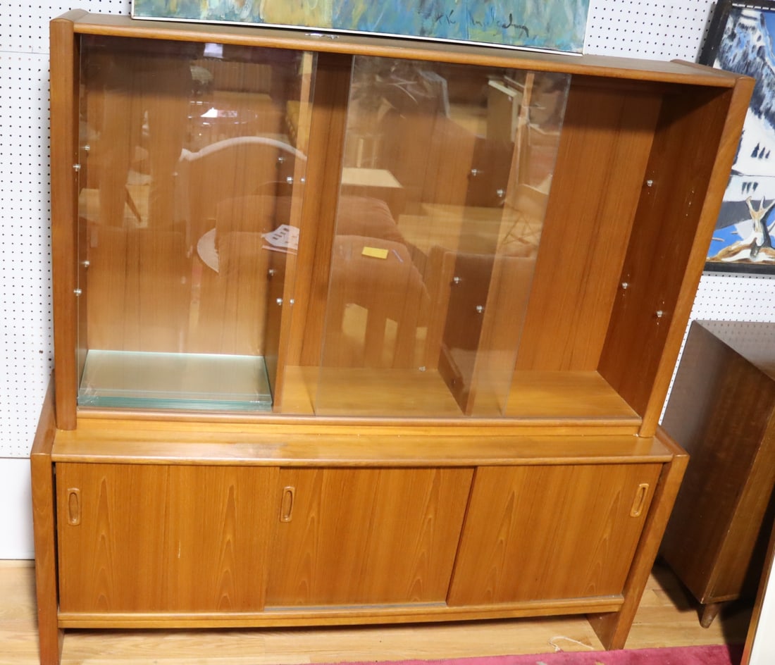 Danish Modern Teak Sliding Door Cabinet: china cabinet atop a 3 sliding door cabinet. From a Fairfield, CT estate. - Dimensions: 70" h x 71" w x 19" d.