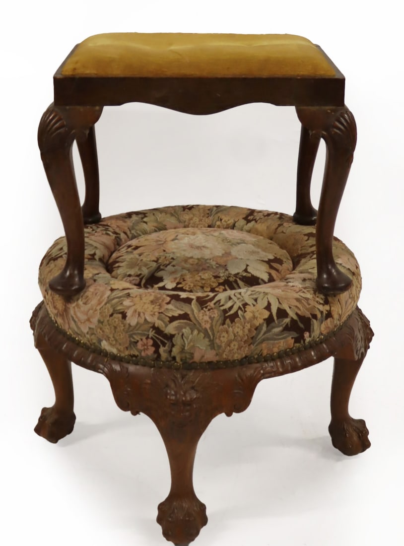 (2) Antique Carved Ottomans.: One is Irish style, oak with a carved lion head and hairy paw feet (19" h x 27.5" dia) and the other Q.A. style mahogany (17" h x 23.25" wx 18.5" d). From a Northport, LI esta