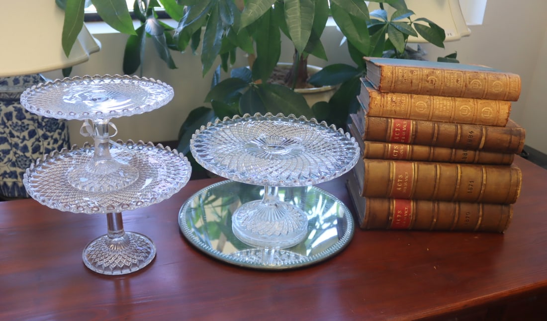 Collection of Decorative Objects Inc. Victorian.: Includes a set of (3) Victorian graded cake plates, circa 1930. Dimensions: largest cake plate measures 11.25" in diameter x 6.125" h; (6) assorted leather bound books; and an English Victor