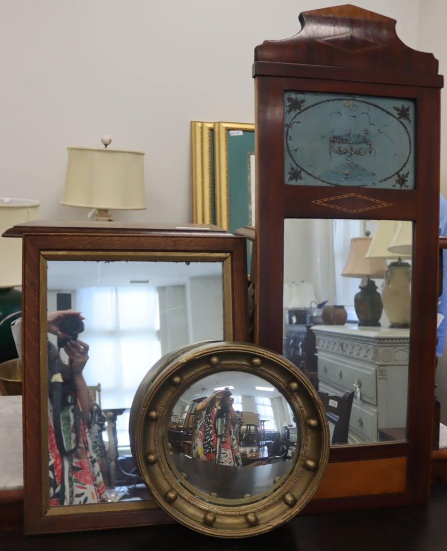 Collection of (3) Antique Mirrors.: Includes an English oak rectangular frame with gold ferral, circa 1900; an English gilt framed bullseye mirror; and an antique mirror with eglomise crown. Dimensions: eglomise mirror measures approx.