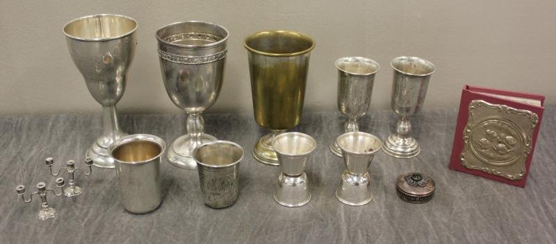 .800 Continental Silver Kiddish Cup Lot.: Includes 3 large cups, 4 small shot glasses, a miniature pair of candelabras, and a small hinged box. Approx. 12 troy oz. From a Bronx, NY estate.