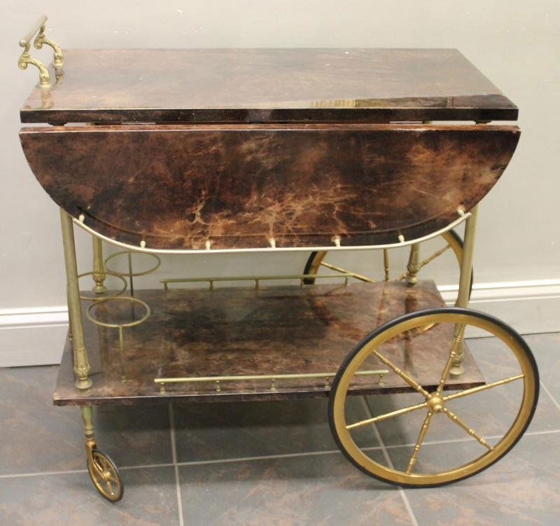 Midcentury Aldo Tura Tea Cart.: From a Bronx, NY estate. Dimensions: 33.25" wide x 17.5" deep x 31.125" high.