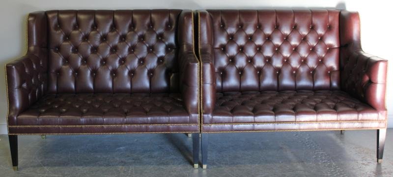 Pair of Leather Chesterfield Style High Back: Loveseats. From a Tenafly, NJ estate. Dimensions: 60.5" wide x 39" deep x 48.5 high. Condition: Good.