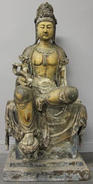 Large and Impressive Antique Chinese Carved and: Painted Bodhisattva. Holding a Ruyi scepter. Identified as Ming Dynasty? by previous appraisal. From a Rye, NY estate. Dimensions: 30" wide x 24.5" deep x 59" high. Condition: Areas of paint loss; Wit