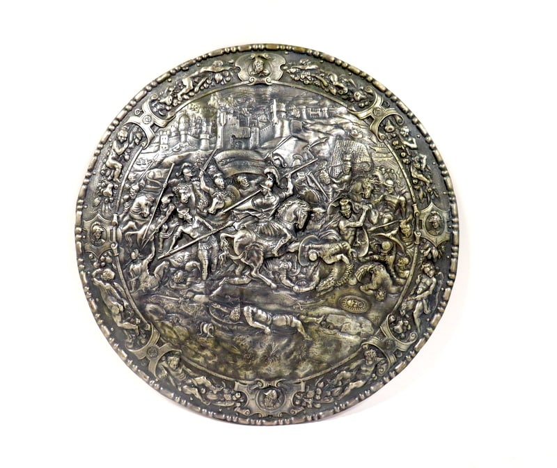 16th-century Spanish Philip II Shield Replica.: This exquisite replica of a 16th-century Spanish shield, originally owned by Philip II of Spain, is a stunning tribute to some of the finest craftsmanship of the period. The original shield, which dep