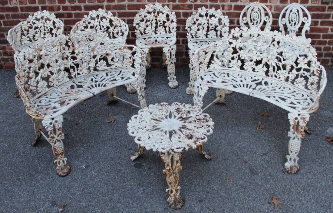 9 Piece Antique Wrought Iron Patio Furniture Lot.: Includes 2 settees (28.25" h x 36.5" w x 13" d), 2 pairs of chairs (arm: 26.5" h x 20" w x 11.5" d and side 26.5" h x 15" w x 10.25" d), and a table (15&qu