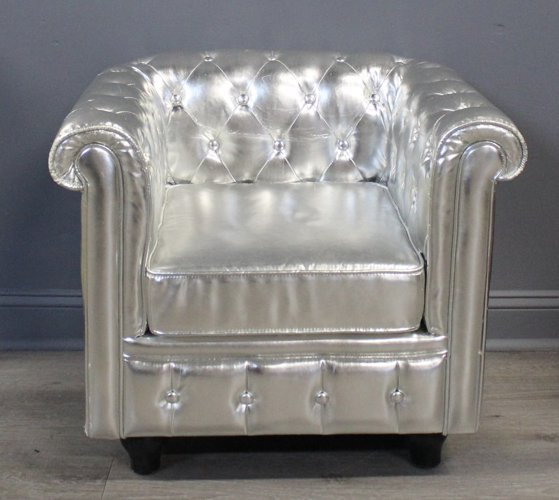 Leather Chesterfield Style Club Chair.: In silver upholstery. From a New Jersey estate. - Dimensions: 27" h x 31" w x 26" d.
