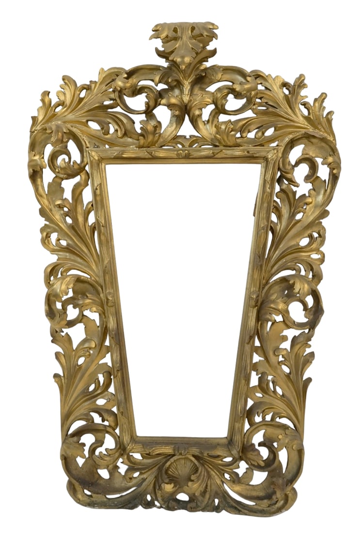 Antique Rococo Carved Giltwood Frame.: From a Mamaroneck, NY estate. Dimensions: 54" h x 34.5" widest point and the interior opening is approximately 31" h, 11.5" at smallest to 18.25" largest width.