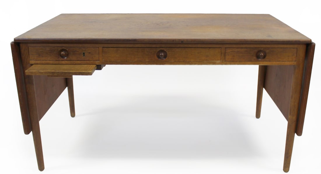 HANS WEGNER (Denmark, 1914-2007).: Displays (3) frieze drawers with a single drawer lock and drop sides. Dimensions: 28" h x 55" w x 30" d; overall: 28" x 55" x 91" (open).