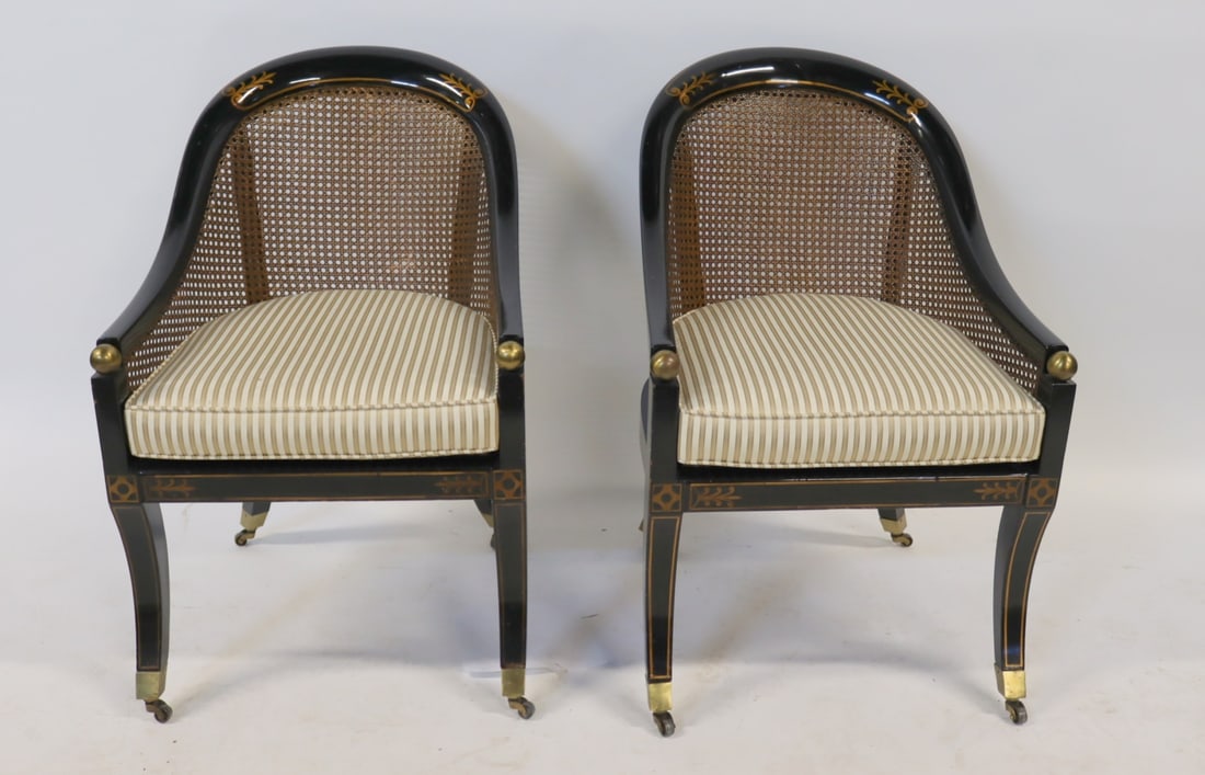 A Vintage Pair Of Ebonised Gilt Caned Back: Neoclassical Style Chairs. From a Lawrence, Long Island, NY estate. - Dimensions: 33.5" h x 21.25" x 21" d.
