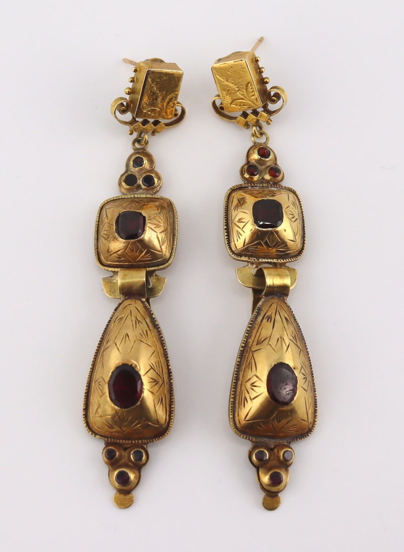 JEWELRY. Pair of Victorian Garnet Drop Earrings.: Pair of Victorian gold foil? drop form earrings accented by garnets. With 14kt gold backings/posts. From a Greenwich, CT estate. Dimensions: earrings measure approx. 3.0" in length.
