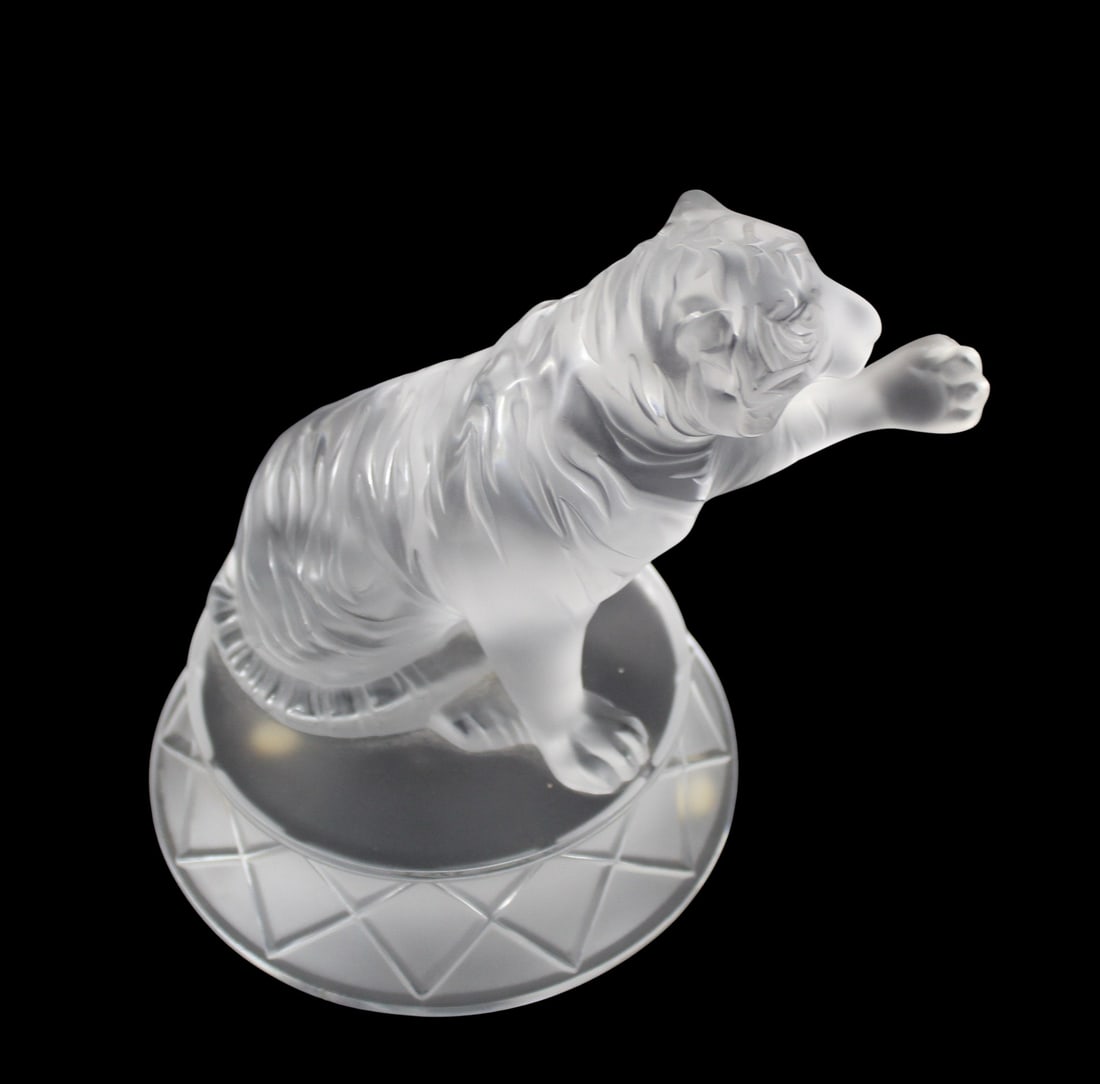 LALIQUE France Signed Glass Tiger.: "Tiger Tigrou". Glass Circus Tiger, signed and with label. From an 1135 Park Ave NYC estate. - Dimensions: 6.5" h x 7.5" approx.