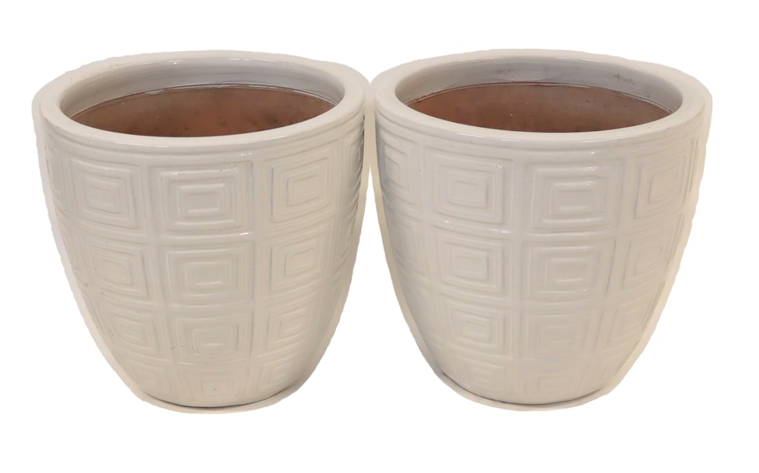 Pair of Contemporary White Glazed Terracotta.: Planters. From a Garden City, NY estate. Dimensions: 17.5" h x 18.25" diameter.