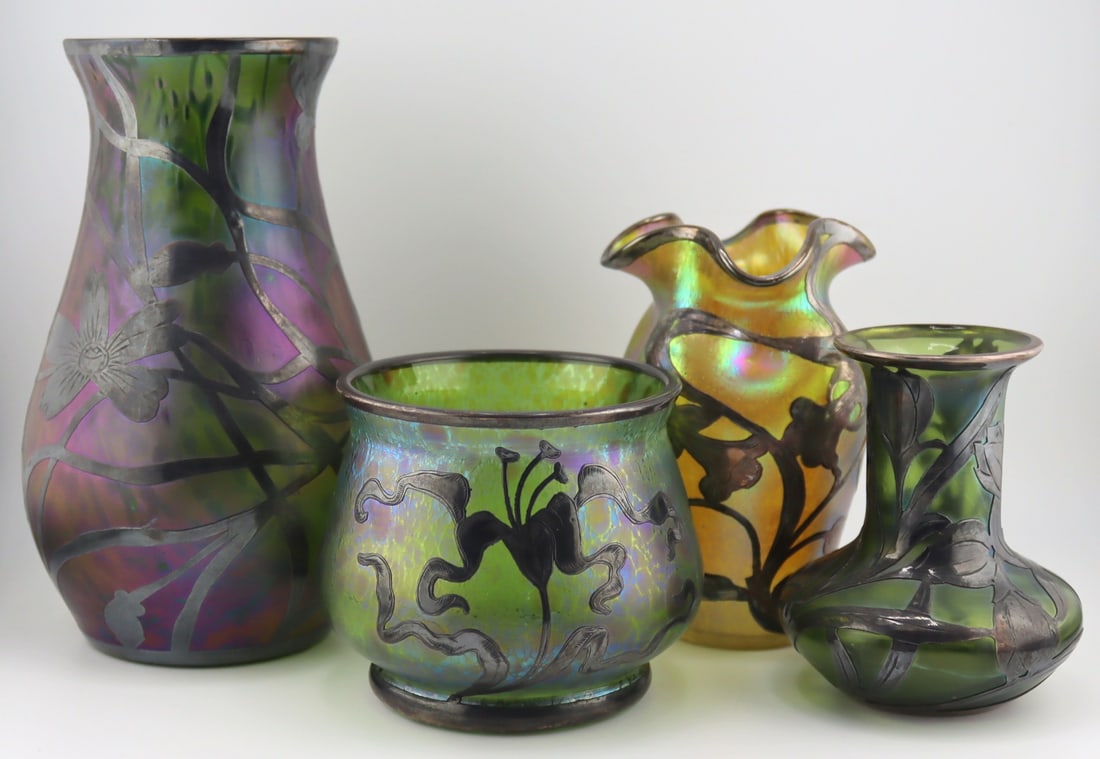 (4) Silver Overlay Loetz Style Favrile Glass Vases: Includes a silver overlay Loetz style favrile vase with a floral motif; a Loetz style silver overlay vase with single flower; an Alvin silver overlay favrile glass vase, no. 3376; and a Loetz style fa
