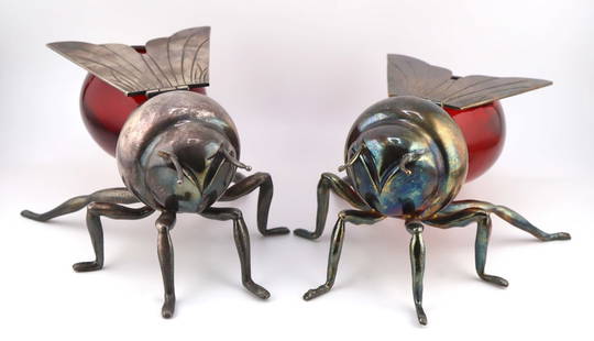 SILVERPLATE. (2) Mappin & Webb Silverplate Honey: Bees. (2) Mappin & Webb silverplate honey bees with hinged wings and red glass bowls. Each stamped "Mappin & Webb" to the underside of each with additional marks. From a Bloomfield,