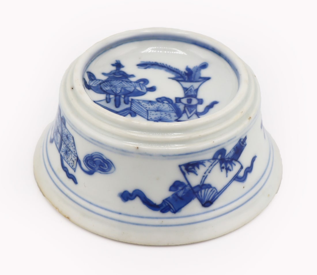 Chinese Blue and White Salt Cellar.: Chinese, possibly KangXi, blue and white salt cellar displaying scholar's items. From a Seacliff, NY estate. Dimensions: salt cellar measures approx. 1.5" h. x 3.375" d.